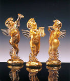 Ange en cristal et or avec une trompette