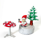 Gnome on wooden base with red mushroom