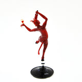 Red Faun with wine bottle