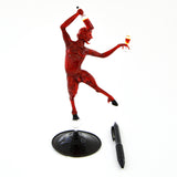 Red devil with wine bottle